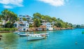 Landscape with boat and Cala D `or city, Palma Mallorca Island, Spain Royalty Free Stock Photo
