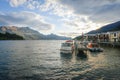 Landscape of boat dock on a lake with beautiful mountain as the background at Queenstown in New Zealand Royalty Free Stock Photo