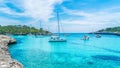 Landscape with boats and turquoise sea water in Cala Mondrago, Majorca island, Spain Royalty Free Stock Photo