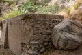 Landscape of boulders at Eaton Canyon hiking trails with wild plants with sunlight