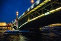 Landscape with bridge at night, view from Neva river in St. Petersburg Royalty Free Stock Photo