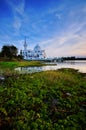 Landscape of Brunei mosque during sunset in front of danau tok uban lake. Kelantan malaysia,  soft focus due to long exposure. Royalty Free Stock Photo