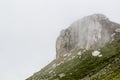 Landscape from Bucegi Mountains, part of Southern Carpathians in Romania in a foggy day Royalty Free Stock Photo