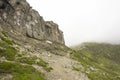 Landscape from Bucegi Mountains, part of Southern Carpathians in Romania in a foggy day Royalty Free Stock Photo