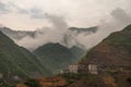 Landscape with buildings on mountains along Xiling Gorge, Shengli Street, China