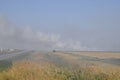 Landscape burning field. The burning of rice straw in the fields. Rice paddies Royalty Free Stock Photo