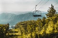 Cableway in Altay mountains with hills in background Royalty Free Stock Photo