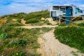 Carvoeira, Ericeira PORTUGAL - 14 April 2019 - Lifestyle, Caravan and surfboards in a landscape with maritime vegetation