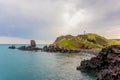 Landscape with Chagwido Island and strange volcanic rocks, view from Olle 12 corse in Jeju Island, Korea.