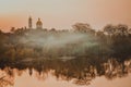 Landscape church river fog