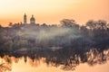 Landscape church river fog