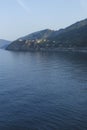 Landscape of Cinque Terre village in a distance with traditional houses coast, vertical shot