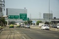 Landscape cityscape of Bang Bua Thong city and life lifestyle local thai people driving riding biking vehicle on highway street