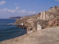 Landscape with cliffs on the coast near Akrotiri. Santorini, Greece.