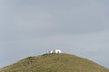 Landscape close up view over a hill with a white walls house under the sunset light, dry nature and Agave plant Royalty Free Stock Photo