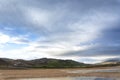 landscape with clouds, red soil wide horizon under the cloudy sky Royalty Free Stock Photo