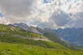 Cloudy mountain tops with glaciers in the French Alps