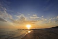 Landscape of cloudy sky sea and beach which has some people do their hobby in holiday morning Royalty Free Stock Photo