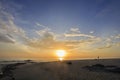 Landscape of cloudy sky sea and beach which has some people do their hobby in holiday morning Royalty Free Stock Photo