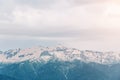 Landscape, cloudy weather, high mountain peaks with snow