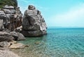 Landscape with coastal cliffs and calm sea on a sunny day