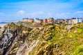 Landscape of colorful houses behind cliffs in Tenby a harbour town and resort in Pembrokeshire, southwest Wales, UK