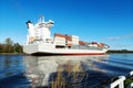 Nord-Ostsee-Kanal with passing container ship near Rendsburg, Germany