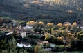 Landscape of the counytryside near Arezzo with a village, hills and mountains in autumn colors