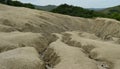 Landscape with cracked soil. Ground shape created by muddy volcanoes and natural-gas eruptions in Berca, Paclele Mari near Buzau