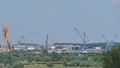 Landscape with cranes in the shipyard in Tulcea, Romania.