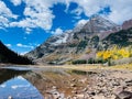 Landscape of Crater Lake Trail at Maroon Bells mountains with blue cloudy sky Royalty Free Stock Photo