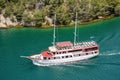 Landscape of a cruise ship on the river surrounded by greenery in Skradin, Croatia Royalty Free Stock Photo