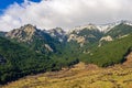 Landscape of Cuerda Larga mountain range with snow in the summits