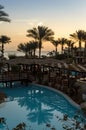 Landscape dawn sky palms and hotel in egypt