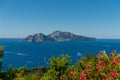 Landscape depicting the Capri Island framed by sea and sky, taken on a summer day Royalty Free Stock Photo