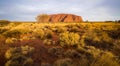 Landscape of a deserted valley on the background of the Uluru