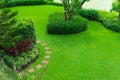 Landscape design freshly mowed lawn. top-view garden landscape design with paths intersecting bright. green grass shrub lawn care