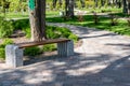 Landscape design, garden architecture. Bench, alleys and pedestrian paths in square or park on sunny summer day. Place Royalty Free Stock Photo