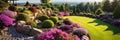 Landscape design of home garden with retaining walls, panoramic view of luxury house backyard. Beautiful flowers, rocks and stones Royalty Free Stock Photo