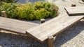 Decorative bench with overlapping wooden structures