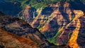 Landscape detail of beautiful Waimea canyon colorful cliffs and waterfall, Kauai, Hawaii Royalty Free Stock Photo