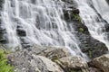 Landscape detail of waterfall over rocks in Summer long exposure Royalty Free Stock Photo