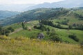 Landscape with dirt road in the mountains under cloudy sky Royalty Free Stock Photo