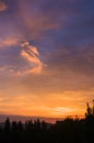 Landscape with dramatic light - beautiful golden sunset with saturated sky and clouds Royalty Free Stock Photo