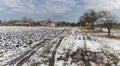 Landscape with an earth road leading to remote Ukrainian village Velyka Budischa, Poltavskaya oblast, Ukraine Royalty Free Stock Photo