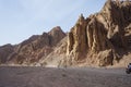 Tourists ride ATV through the picturesque places of Dahab, South Sinai Governorate, Egypt Royalty Free Stock Photo