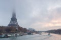 Landscape with eiffel tower, fog and Seine river