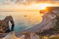 Landscape of empty Durdle Door beach at Sunset. Dorset England. Royalty Free Stock Photo