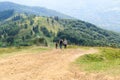 Landscape family travels tourists high up in the mountains