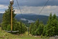 Landscape with Fantanele-Belis lake and chairlift at the ski slope from Marisel, Romania. Royalty Free Stock Photo